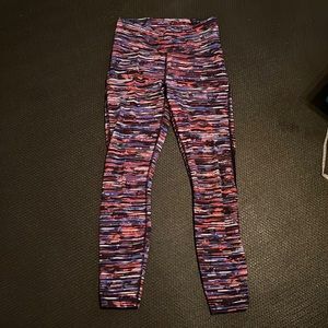 Lululemon size 6 tights, fun pattern.